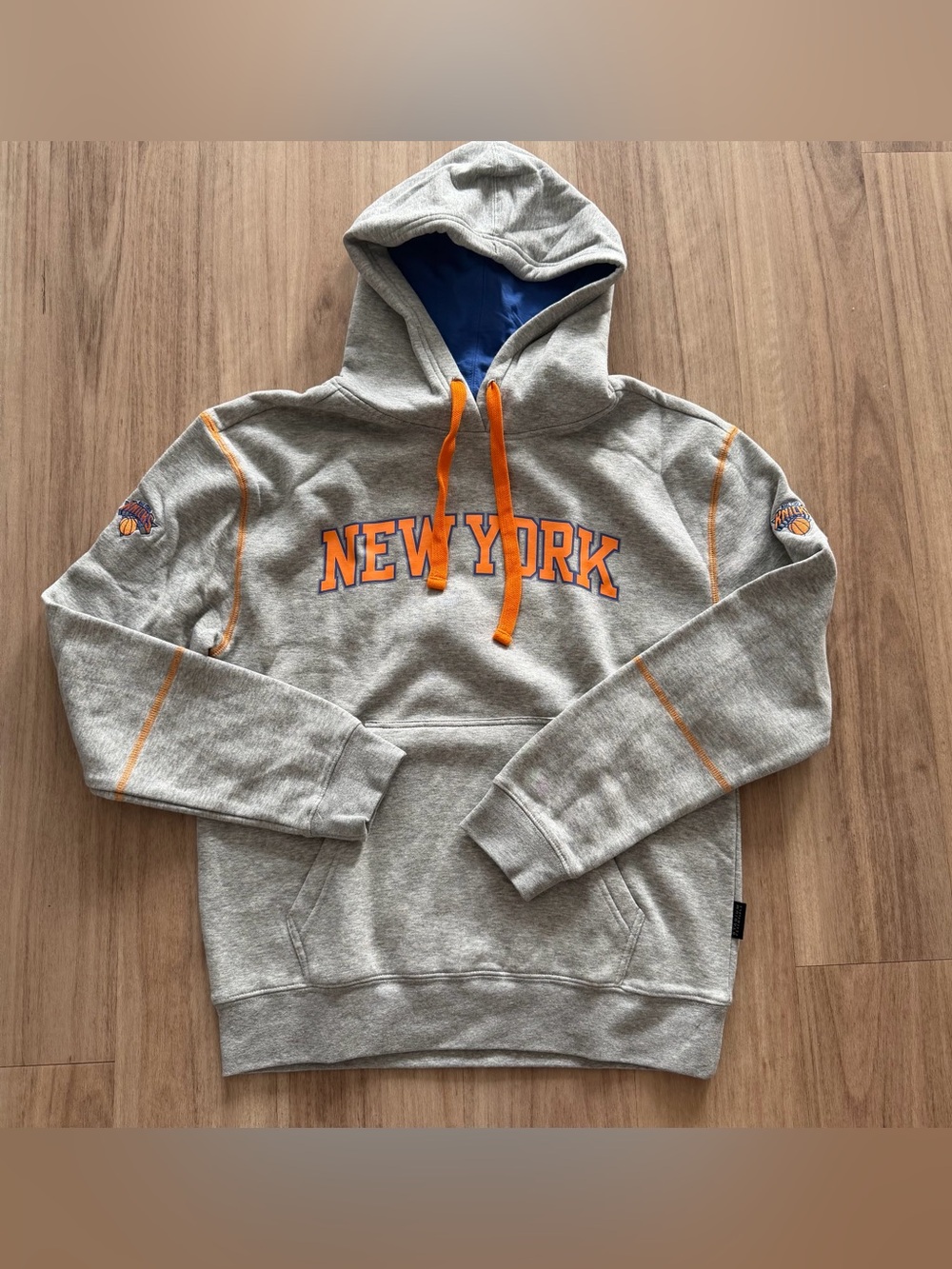 Gray New York Knick Pullover Hoodie with Orange Accents